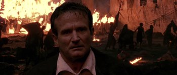 Movie still from “What Dreams May Come” (1998), directed by Vincent Ward – A person wearing a suit and tie; Close Up shot, Over the shoulder angle