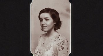Movie still from “What We Do in the Shadows” (2014), directed by Taika Waititi – An old photo of a woman in a white dress; Close Up shot, High angle
