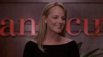 Movie still from “What Women Want” (2000), directed by Nancy Meyers – A woman with blonde hair wearing a black top; Close Up shot, Over the shoulder angle