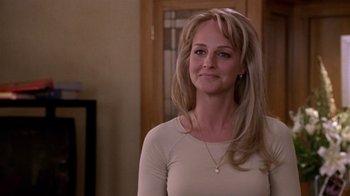 Movie still from “What Women Want” (2000), directed by Nancy Meyers – A woman with long blonde hair wearing a white shirt; Close Up shot, Over the shoulder angle
