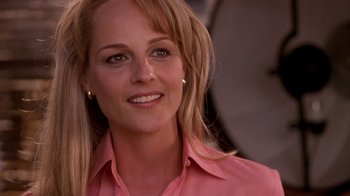 Movie still from “What Women Want” (2000), directed by Nancy Meyers – A person wearing a pink shirt; Close Up shot, Over the shoulder angle