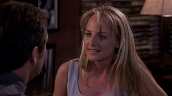 Movie still from “What Women Want” (2000), directed by Nancy Meyers – A woman with long blonde hair talking to a man; Close Up shot, Over the shoulder angle