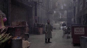 Movie still from “What Women Want” (2000), directed by Nancy Meyers – A man walking down a street in a city; Wide shot, High angle