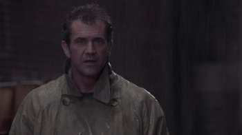 Movie still from “What Women Want” (2000), directed by Nancy Meyers – A person wearing a jacket; Close Up shot, Low angle