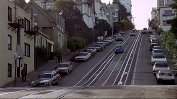 Movie still from “What's Up, Doc?” (1972), directed by Peter Bogdanovich – Cars are parked on the side of the street; Extreme Wide shot, High angle