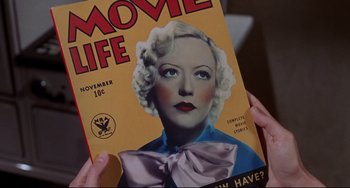 Movie still from “What's the Matter with Helen?” (1971), directed by Curtis Harrington – A person holding a movie life magazine in their hands; Extreme Close Up shot, High angle