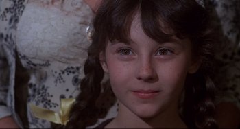 Movie still from “What's the Matter with Helen?” (1971), directed by Curtis Harrington – A young girl's face; Close Up shot, Low angle