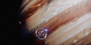 Movie still from “Another Life” (2019), created by Aaron Martin – A view of the solar system taken from a space craft; Extreme Wide shot, Overhead angle