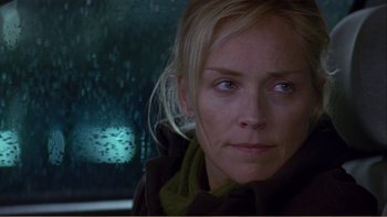 Movie still from “When a Man Falls” (2007), directed by Ryan Eslinger – A person in a car; Close Up shot, Over the shoulder angle