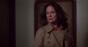 Movie still from “When a Stranger Calls” (1979), directed by Fred Walton – A person wearing a jacket; Close Up shot, Over the shoulder angle