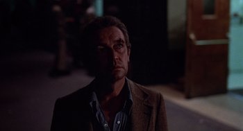 Movie still from “When a Stranger Calls” (1979), directed by Fred Walton – A person wearing a jacket; Close Up shot, Low angle