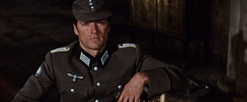 Movie still from “Where Eagles Dare” (1968), directed by Brian G. Hutton – A person wearing a uniform; Close Up shot, Low angle