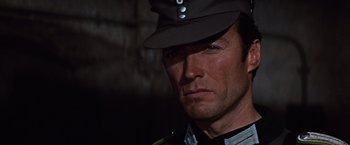 Movie still from “Where Eagles Dare” (1968), directed by Brian G. Hutton – A person wearing a hat; Close Up shot, Low angle