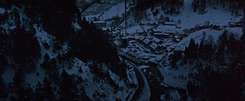 Movie still from “Where Eagles Dare” (1968), directed by Brian G. Hutton – A cable car going down a mountain at night time; Extreme Wide shot, High angle