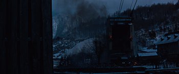 Movie still from “Where Eagles Dare” (1968), directed by Brian G. Hutton – A view of a snowy mountain from a train window at night; Extreme Wide shot, Low angle