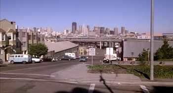 Movie still from “Where the Buffalo Roam” (1980), directed by Art Linson – A view of a city from a distance; Extreme Wide shot, High angle