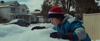 Movie still from “Where the Wild Things Are” (2009), directed by Spike Jonze – A young boy is playing in the snow outside; Medium shot, Low angle