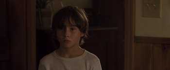 Movie still from “Where the Wild Things Are” (2009), directed by Spike Jonze – A young boy is looking into the camera; Close Up shot, High angle