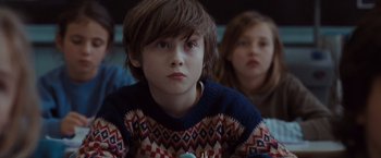Movie still from “Where the Wild Things Are” (2009), directed by Spike Jonze – A boy and a little girl sitting on a couch; Close Up shot, Over the shoulder angle