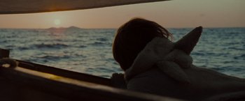 Movie still from “Where the Wild Things Are” (2009), directed by Spike Jonze – A person sitting on a boat looking out at the ocean; Close Up shot, Over the shoulder angle