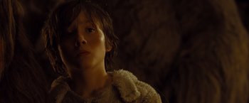 Movie still from “Where the Wild Things Are” (2009), directed by Spike Jonze – A young boy wearing a fur coat looking into the camera; Close Up shot, Low angle