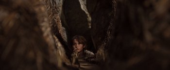 Movie still from “Where the Wild Things Are” (2009), directed by Spike Jonze – A young boy is looking out from a cave; Close Up shot, Low angle