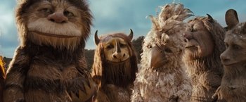 Movie still from “Where the Wild Things Are” (2009), directed by Spike Jonze – A group of people dressed up like animals; Medium shot, Low angle