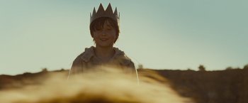 Movie still from “Where the Wild Things Are” (2009), directed by Spike Jonze – A young boy wearing a paper crown and a fur coat; Close Up shot, Low angle