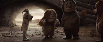 Movie still from “Where the Wild Things Are” (2009), directed by Spike Jonze – A group of people that are standing in the dirt; Wide shot, Low angle
