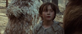 Movie still from “Where the Wild Things Are” (2009), directed by Spike Jonze – A young boy in a fur coat looking at the camera; Close Up shot, Low angle