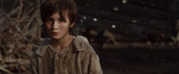 Movie still from “Where the Wild Things Are” (2009), directed by Spike Jonze – A young boy wearing a fur coat in an arena; Close Up shot, Low angle