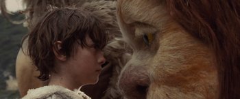 Movie still from “Where the Wild Things Are” (2009), directed by Spike Jonze – A boy and a dog face each other in a scene; Close Up shot, Low angle