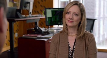 Movie still from “Where'd You Go, Bernadette” (2019), directed by Richard Linklater – A woman sitting in front of a computer in a room; Close Up shot, Over the shoulder angle