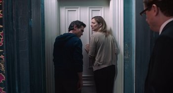 Movie still from “Where'd You Go, Bernadette” (2019), directed by Richard Linklater – A man and a woman standing next to each other; Medium shot, Low angle