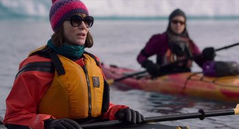 Movie still from “Where'd You Go, Bernadette” (2019), directed by Richard Linklater – Two people in kayaks on a body of water; Medium shot, Over the shoulder angle