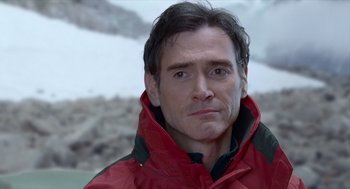 Movie still from “Where'd You Go, Bernadette” (2019), directed by Richard Linklater – A person wearing a red jacket; Close Up shot, Over the shoulder angle