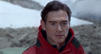 Movie still from “Where'd You Go, Bernadette” (2019), directed by Richard Linklater – A person wearing a red jacket; Close Up shot, Over the shoulder angle