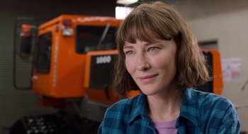 Movie still from “Where'd You Go, Bernadette” (2019), directed by Richard Linklater – A person wearing a plaid shirt; Close Up shot, Over the shoulder angle