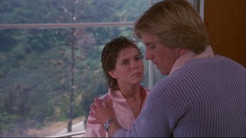 Movie still from “White Dog” (1982), directed by Samuel Fuller – An older woman and a younger woman looking at each other; Close Up shot, Over the shoulder angle