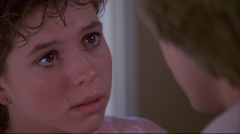 Movie still from “White Dog” (1982), directed by Samuel Fuller – A person looking at the camera; Close Up shot, Over the shoulder angle