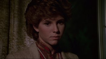 Movie still from “White Dog” (1982), directed by Samuel Fuller – A person wearing a jacket; Close Up shot, High angle