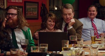 Movie still from “Why Him?” (2016), directed by John Hamburg – A man and a woman sitting in front of an open laptop computer; Medium shot, Over the shoulder angle