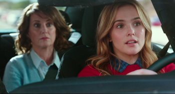 Movie still from “Why Him?” (2016), directed by John Hamburg – Two women sitting in the back seat of a car; Close Up shot, Over the shoulder angle