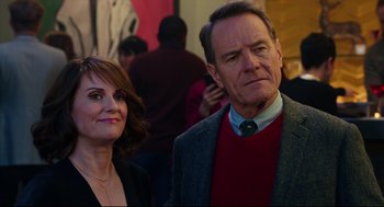 Movie still from “Why Him?” (2016), directed by John Hamburg – A man and a woman standing next to each other; Close Up shot, Over the shoulder angle