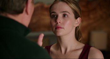 Movie still from “Why Him?” (2016), directed by John Hamburg – A young woman looking at a man in a room; Close Up shot, Over the shoulder angle