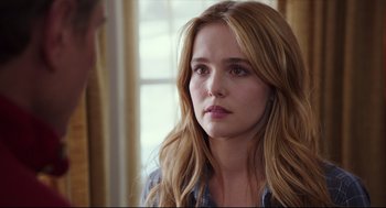 Movie still from “Why Him?” (2016), directed by John Hamburg – A woman with long blonde hair looking at the camera; Close Up shot, Over the shoulder angle