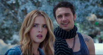 Movie still from “Why Him?” (2016), directed by John Hamburg – A man and a woman standing next to each other; Close Up shot, Over the shoulder angle