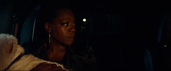 Movie still from “Widows” (2018), directed by Steve McQueen – A black woman looking up in the dark; Close Up shot, Over the shoulder angle