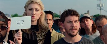 Movie still from “Widows” (2018), directed by Steve McQueen – A group of people standing next to each other; Close Up shot, Low angle