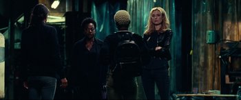 Movie still from “Widows” (2018), directed by Steve McQueen – A group of women standing next to each other; Medium shot, Low angle